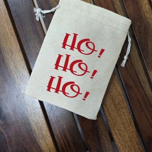 Christmas Drawstring Gift Bag with Festive Printed Designs image 3