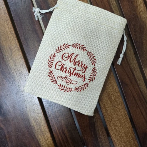 Christmas Drawstring Gift Bag with Festive Printed Designs image 2