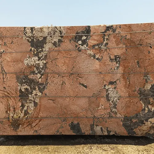 Polished Red Granite Slab with Bold Black and Cream Mineral Movement